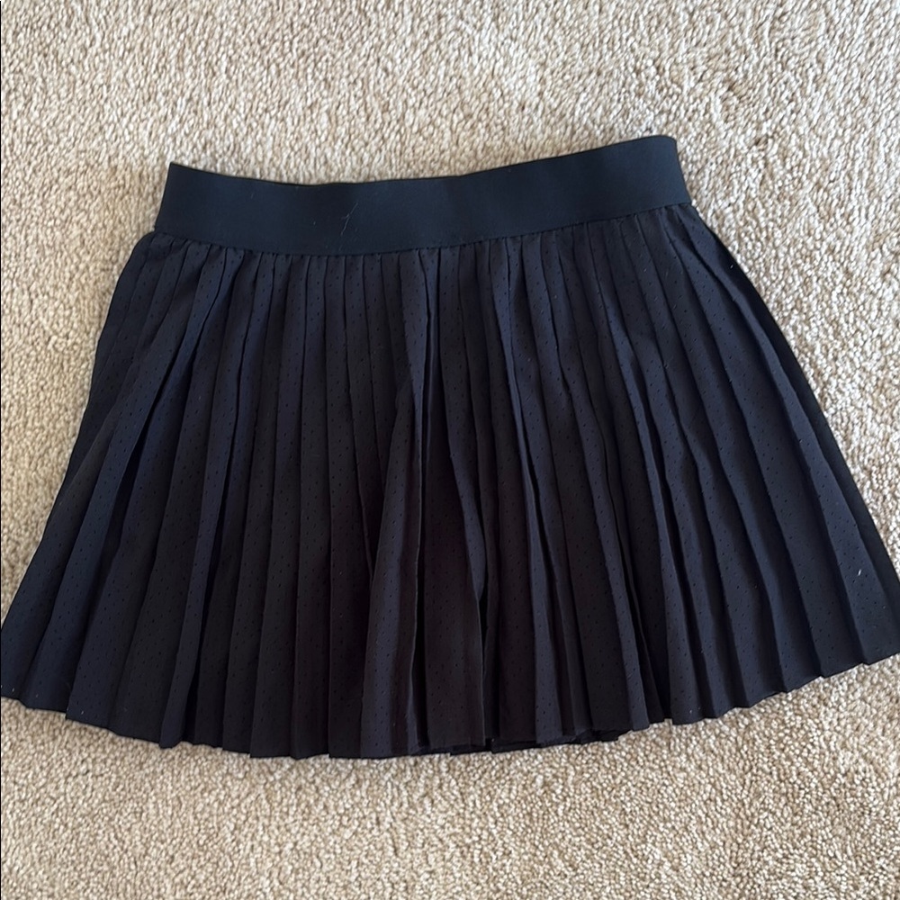 Cute Black Pleated Skirt with shorts attached.